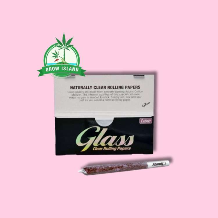 Glass Clear Rolling Papers and a joint with hell rose background and green grow island logo in the left upper corner