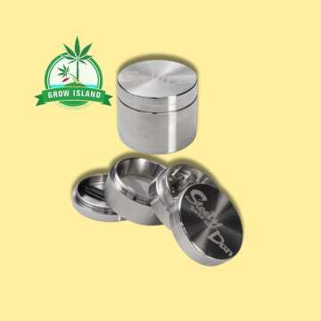 Black Leaf Steely Dan Edelstahl-Grinder in four pieces holder with yellow background and green grow island logog in the left upper corner