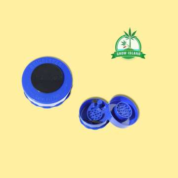 one opened blue and one closed blue grinder from GrinderVac with yellow background and green Grow Island logo in the right upper corner