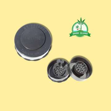 one opened black and one closed black grinder from GrinderVac with yellow background and green Grow Island logo in the right upper corner
